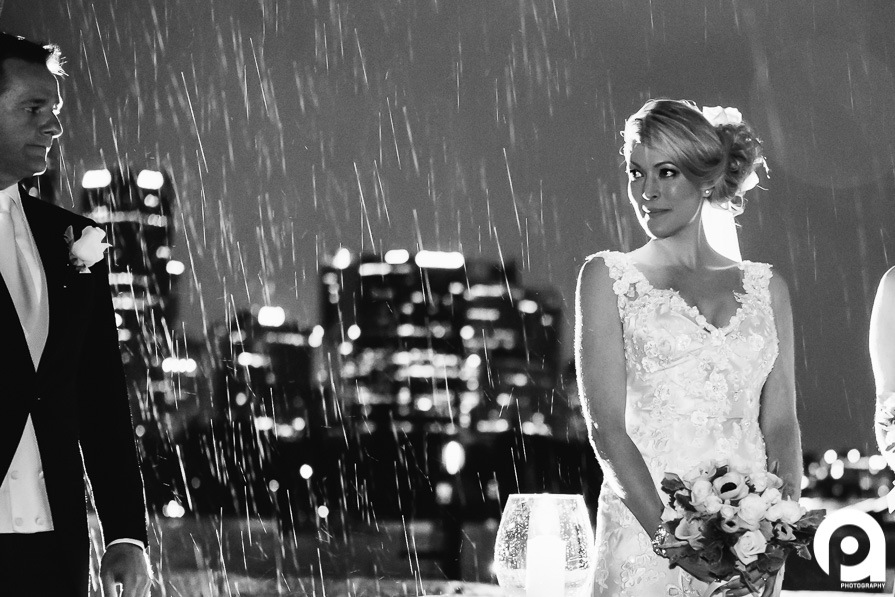Romantic wedding photo in rain